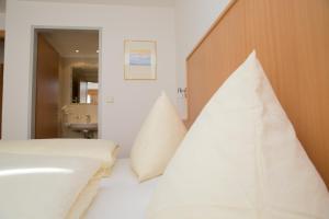Posteľ alebo postele v izbe v ubytovaní Hotel Garni Ehrenreich