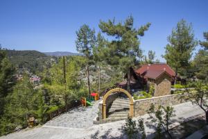 a view from the top of a mountain with a house at Ricky Chalet Near Troodos in Spilia