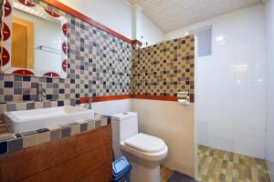 Kylpyhuone majoituspaikassa Beach Villa Ukulhas