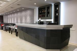 Lounge nebo bar v ubytování Hermes + 24 fotografií