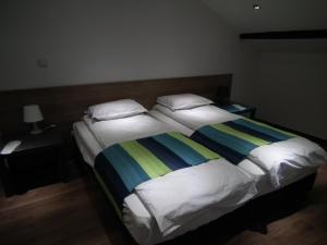 Cama o camas de una habitación en Lion Guest House