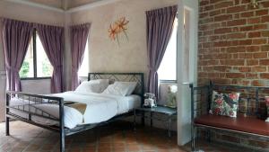 Postel nebo postele na pokoji v ubytování Stamp Hills Resort