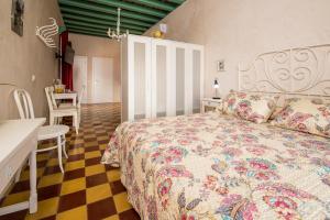 Posteľ alebo postele v izbe v ubytovaní Casa Calle Alta