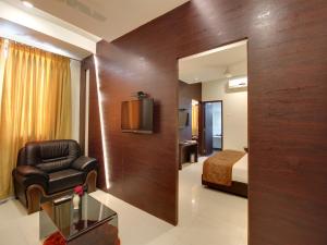 Istumisnurk majutusasutuses Hotel Sai Jashan Shirdi - Where blessings & comfort meet