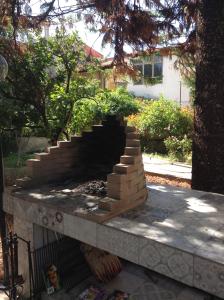 a stack of bricks on top of a stone wall at L'Antica Cantina in Usini