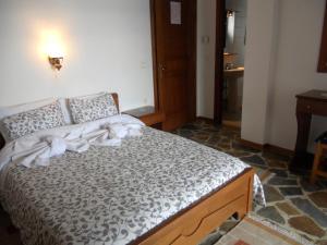 Letto o letti in una camera di Guesthouse Ariadni