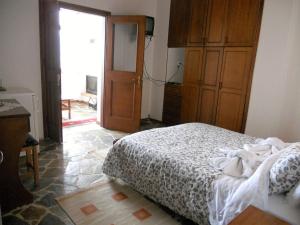 Letto o letti in una camera di Guesthouse Ariadni