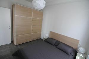 Postelja oz. postelje v sobi nastanitve Appartamento zona Torregalli_Nuvola Viola
