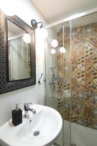Un baño de AbraCadabra Suites
