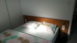Voodi või voodid majutusasutuse Le Tiot Gîte toas