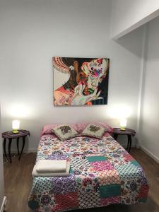 A bed or beds in a room at Apartamentos La Concepción