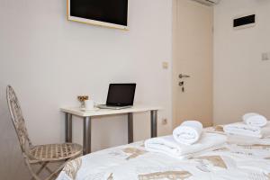 Postel nebo postele na pokoji v ubytování Guest House Paradise