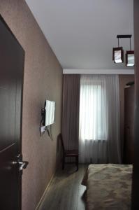 Ένα ή περισσότερα κρεβάτια σε δωμάτιο στο Anna Apartaments on Didveli