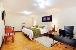Ένα ή περισσότερα κρεβάτια σε δωμάτιο στο Loft Hotel