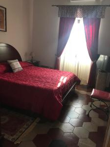 Posteľ alebo postele v izbe v ubytovaní B&B La Staffa
