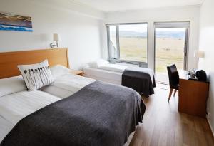 Postel nebo postele na pokoji v ubytování Fosshotel Nupar + 37 fotografií