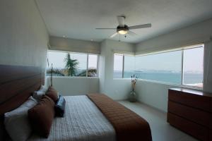 Ένα ή περισσότερα κρεβάτια σε δωμάτιο στο Condominio Marlica +15 φωτογραφίες