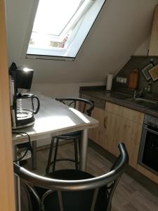 Kuchyň nebo kuchyňský kout v ubytování Appartement Lila