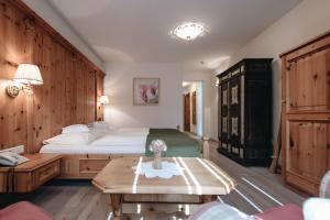DER GREIL - Wein & Gourmethotel客房内的一张或多张床位