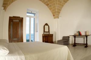 A bed or beds in a room at Residence Castello