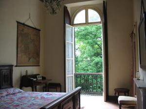 Posteľ alebo postele v izbe v ubytovaní Agriturismo Villa Gropella