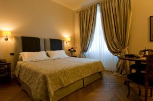 Letto o letti in una camera di Villa Necchi alla Portalupa