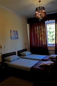 Postel nebo postele na pokoji v ubytování Hotel Meduza