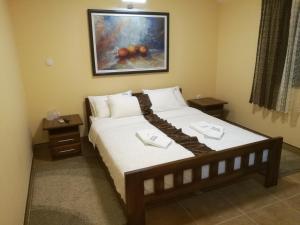 Krevet ili kreveti u jedinici u okviru objekta JOKSIM Rooms&Restaurant