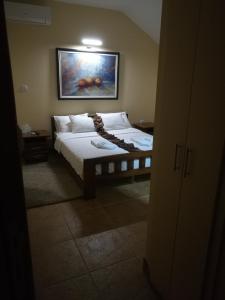 Krevet ili kreveti u jedinici u okviru objekta JOKSIM Rooms&Restaurant
