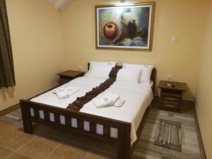 Krevet ili kreveti u jedinici u okviru objekta JOKSIM Rooms&Restaurant