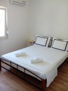 Postel nebo postele na pokoji v ubytování Maja rooms
