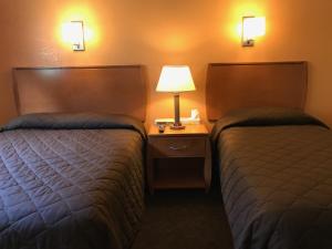 Postel nebo postele na pokoji v ubytování Shelikof Lodge + 34 fotografií