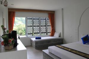 Gallery image of Dinar Lodge in Bang Tao Beach