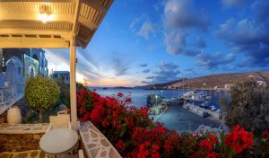 a view of a harbor with boats in the water at Vardia Bay Studios in Karavostasi