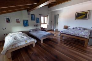Posteľ alebo postele v izbe v ubytovaní La Piccola Torre