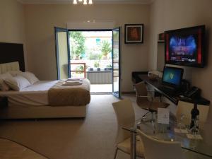 Posteľ alebo postele v izbe v ubytovaní Pearl Bay Hotel Apartments