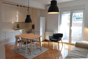 Kuchyň nebo kuchyňský kout v ubytování Apartment Exclusive