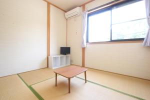 渔房民宿的电视和/或娱乐中心