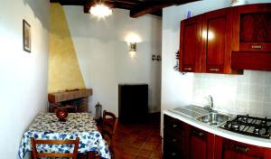 Kuchyňa alebo kuchynka v ubytovaní Belvedere Cramaccioli