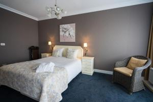 Postel nebo postele na pokoji v ubytování First Euroflat Hotel