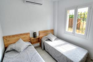 Posteľ alebo postele v izbe v ubytovaní Masia Cal Ros + 37 fotografií