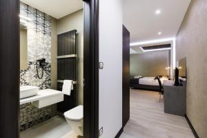 Postel nebo postele na pokoji v ubytování Hotel U Kostela