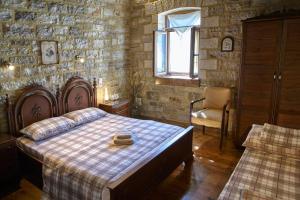 Posteľ alebo postele v izbe v ubytovaní Guesthouse Amalia