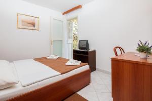 TV a/nebo společenská místnost v ubytování Fontana Resort