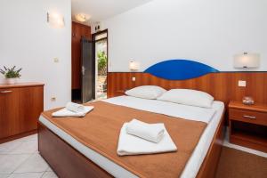 Ліжко або ліжка в номері Fontana Resort