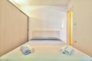 Postel nebo postele na pokoji v ubytování Apartment Katarina