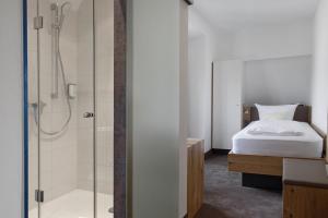 Postel nebo postele na pokoji v ubytování Hotel Seehof