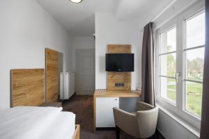 TV a/nebo společenská místnost v ubytování Hotel Seehof