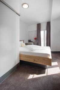 Postel nebo postele na pokoji v ubytování Hotel Seehof