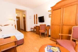 TV a/nebo společenská místnost v ubytování Familie Hopfeld - Hotel Dreikönigshof